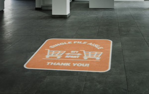 Single File Aisle with Shopping Carts Orange - SignCast™ S200 Virtual Sign